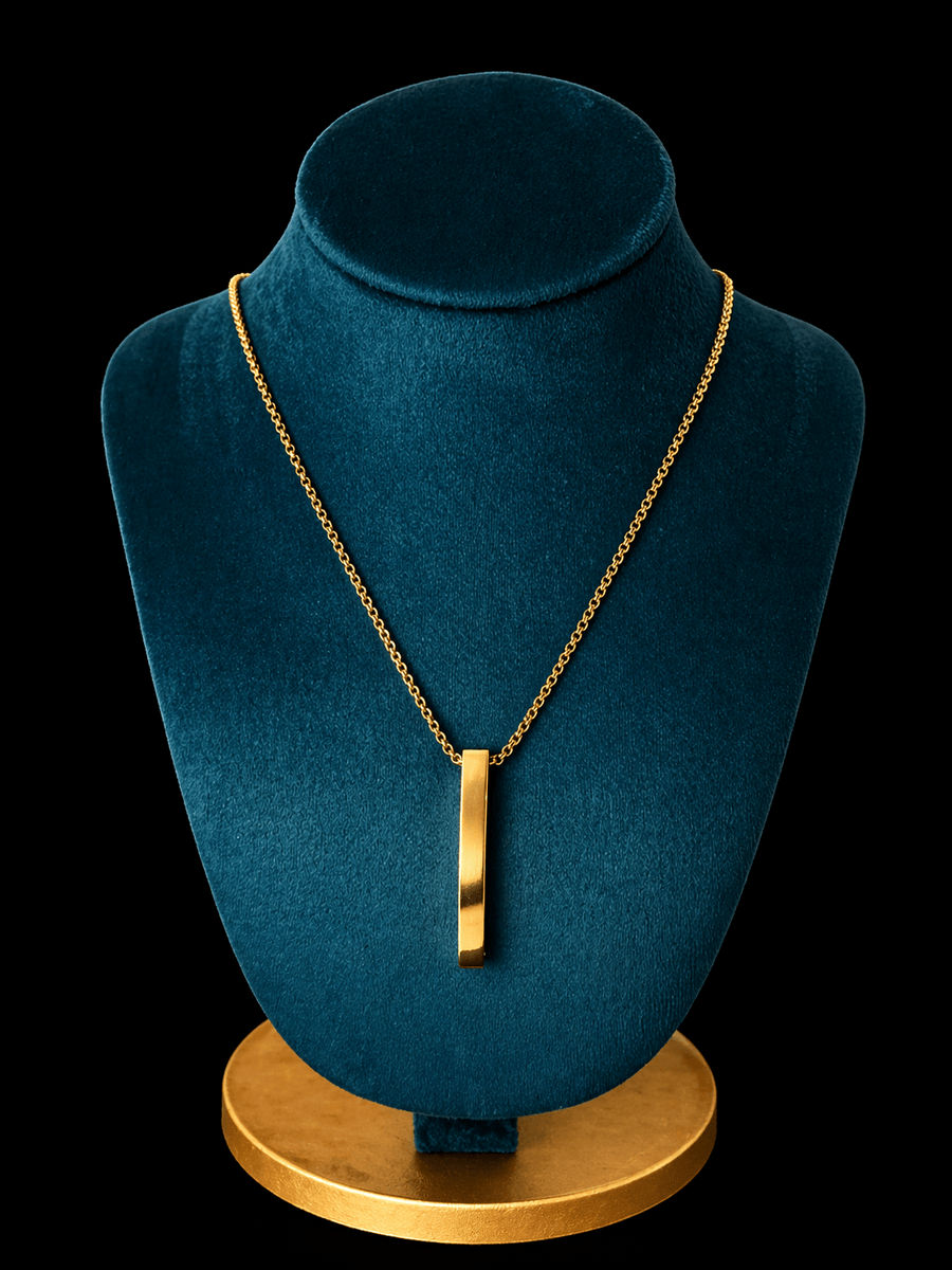 Collar con Dije Monolito Dorado - BRØNNCollar con Dije Monolito DoradoBrønnBRØNNDoradoAcero inoxidableCollar con Dije Monolito Dorado
